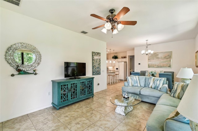 3390 Fallbrook Dr, Kissimmee, FL 34759 - living room featuring a chandelier, ceiling fan, and light tile patterned flooring