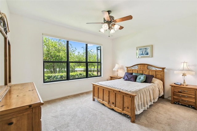 3390 Fallbrook Dr, Kissimmee, FL 34759 - bedroom featuring light colored carpet and ceiling fan