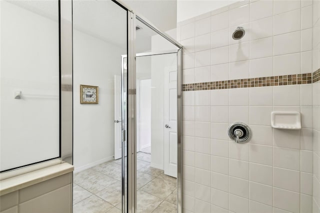 3390 Fallbrook Dr, Kissimmee, FL 34759 - full bathroom with a stall shower and tile patterned flooring