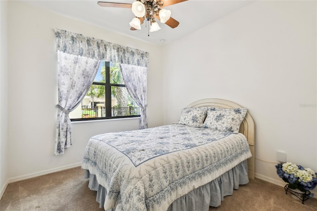 3390 Fallbrook Dr, Kissimmee, FL 34759 - carpeted bedroom featuring baseboards and a ceiling fan
