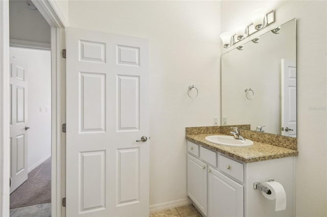3390 Fallbrook Dr, Kissimmee, FL 34759 - bathroom featuring vanity and baseboards