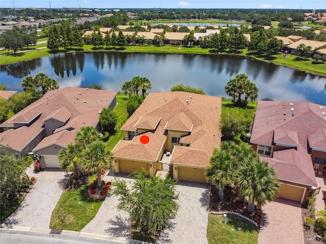 3390 Fallbrook Dr, Kissimmee, FL 34759 - aerial perspective of suburban area featuring a large body of water