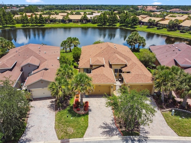 3390 Fallbrook Dr, Kissimmee, FL 34759 - aerial perspective of suburban area featuring a nearby body of water