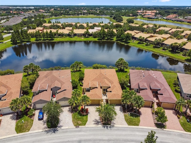 3390 Fallbrook Dr, Kissimmee, FL 34759 - aerial perspective of suburban area with a large body of water