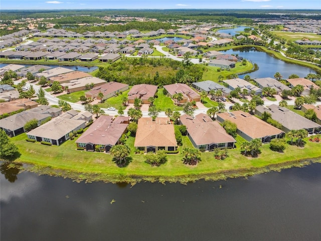 3390 Fallbrook Dr, Kissimmee, FL 34759 - aerial view of property and surrounding area featuring nearby suburban area and a large body of water