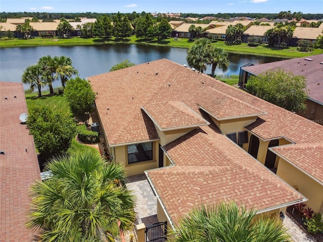 3390 Fallbrook Dr, Kissimmee, FL 34759 - aerial perspective of suburban area with a nearby body of water