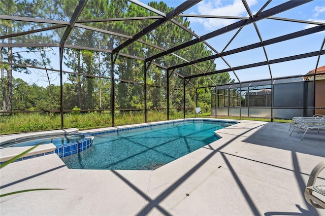 143 Tiger Lily Ct, Davenport, FL 33837 - view of pool featuring a pool with connected hot tub, a patio, and a lanai