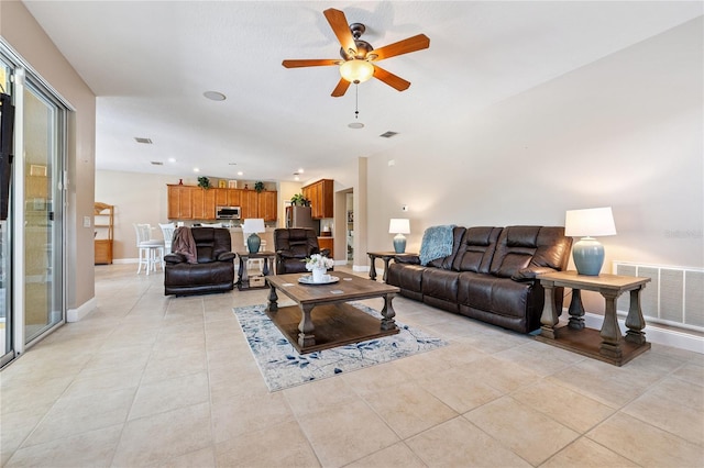 143 Tiger Lily Ct, Davenport, FL 33837 - living room featuring ceiling fan, light tile patterned flooring, and recessed lighting