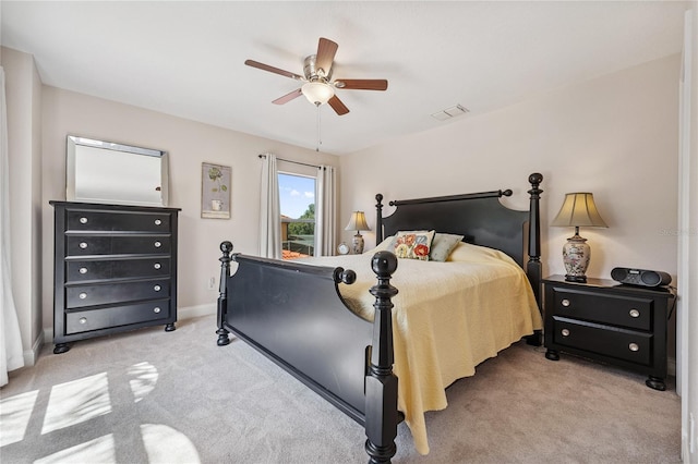 143 Tiger Lily Ct, Davenport, FL 33837 - bedroom with light carpet and ceiling fan