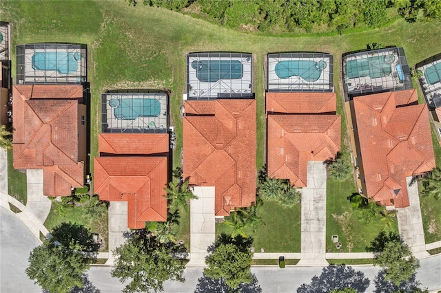 143 Tiger Lily Ct, Davenport, FL 33837 - drone / aerial view of a pool area