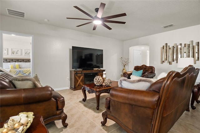 555 Lucerne Blvd, Winter Haven, FL 33881 - living area featuring ceiling fan and light tile patterned floors