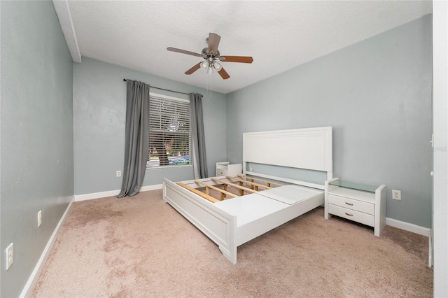 5548 Metrowest Blvd Unit 202, Orlando, FL 32811 - bedroom featuring light carpet and a ceiling fan