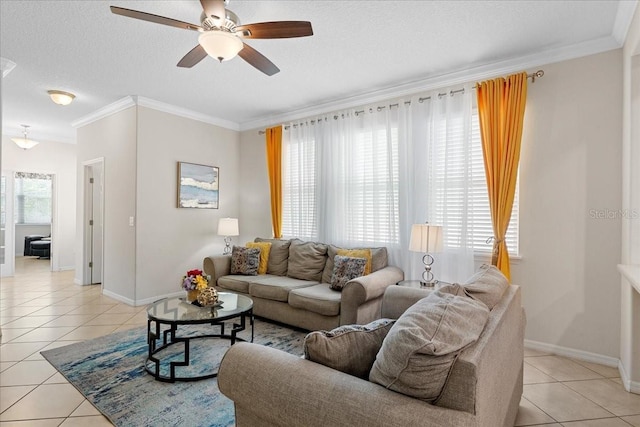 2511 Nouveau Way, Kissimmee, FL 34741 - living room with light tile patterned floors, a ceiling fan, ornamental molding, and a textured ceiling