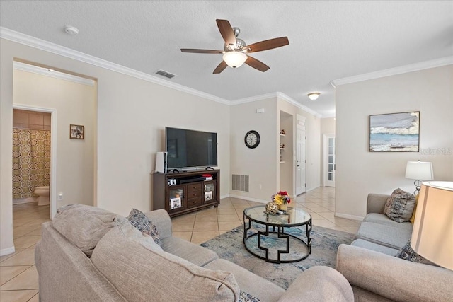 2511 Nouveau Way, Kissimmee, FL 34741 - living area featuring light tile patterned floors, a ceiling fan, crown molding, and a textured ceiling
