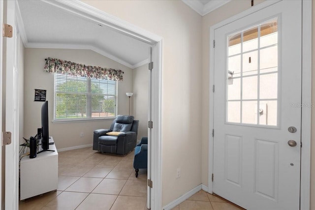 2511 Nouveau Way, Kissimmee, FL 34741 - entryway featuring ornamental molding, light tile patterned flooring, and lofted ceiling