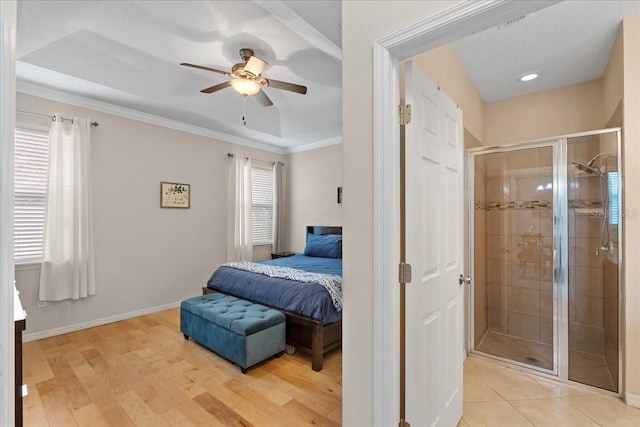 2511 Nouveau Way, Kissimmee, FL 34741 - bedroom with ornamental molding, light wood-style flooring, and a ceiling fan