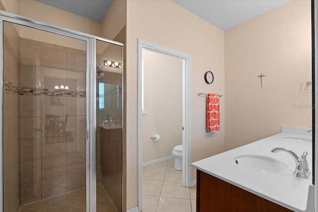2511 Nouveau Way, Kissimmee, FL 34741 - full bathroom with double vanity, a shower stall, and tile patterned flooring