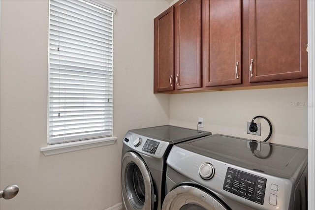2511 Nouveau Way, Kissimmee, FL 34741 - washroom featuring washing machine and dryer and cabinet space