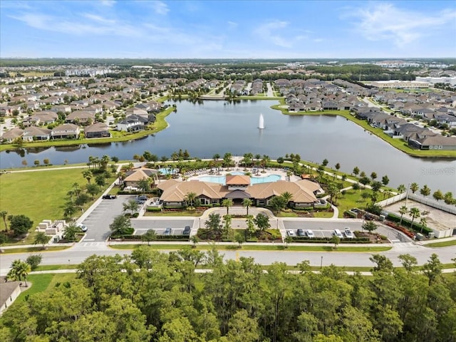 2511 Nouveau Way, Kissimmee, FL 34741 - aerial overview of property's location with a nearby body of water and nearby suburban area