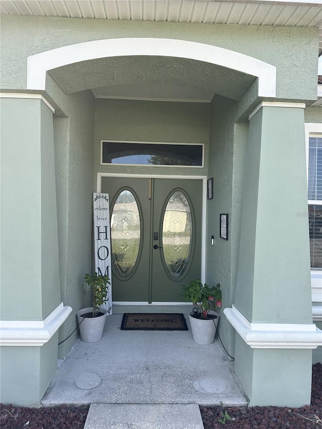 6003 Live Oak Dr, Winter Haven, FL 33880 - property entrance featuring stucco siding