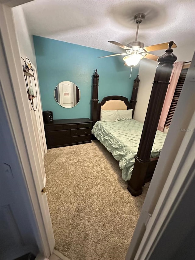 6003 Live Oak Dr, Winter Haven, FL 33880 - bedroom with carpet flooring and a ceiling fan
