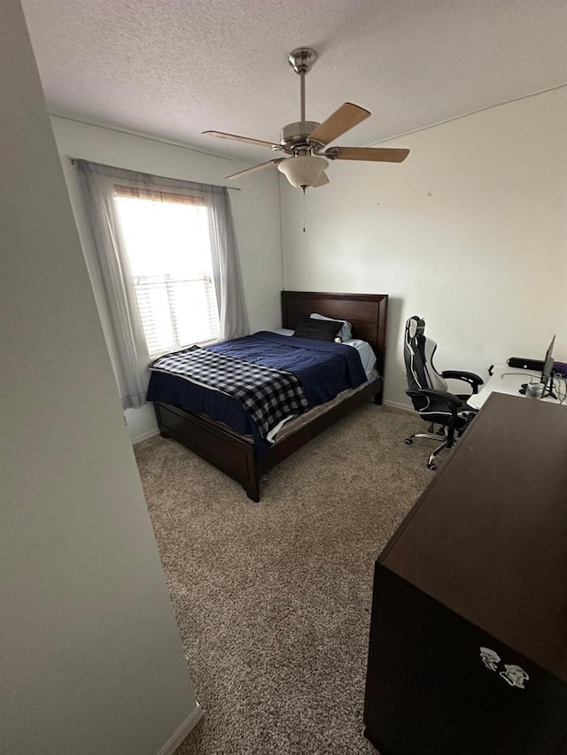 6003 Live Oak Dr, Winter Haven, FL 33880 - carpeted bedroom featuring ceiling fan and a textured ceiling