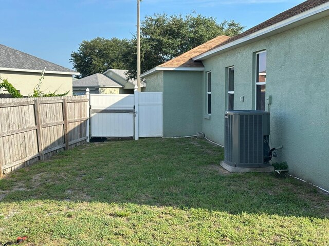 6003 Live Oak Dr, Winter Haven, FL 33880 - fenced backyard featuring a gate