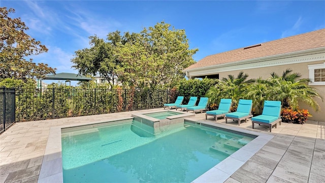 7551 Excitement Dr, Reunion, FL 34747 - view of swimming pool featuring a pool with connected hot tub and a patio area