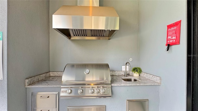 7551 Excitement Dr, Reunion, FL 34747 - view of patio with a grill and a sink