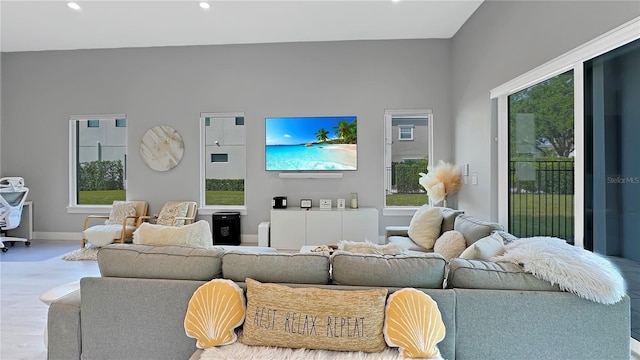 7551 Excitement Dr, Reunion, FL 34747 - living area with recessed lighting and wood finished floors