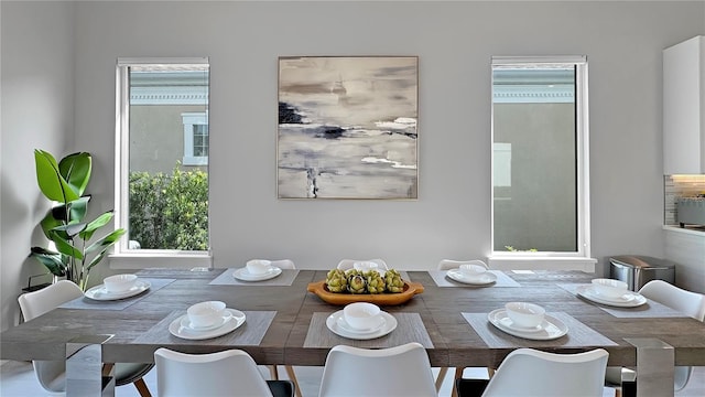7551 Excitement Dr, Reunion, FL 34747 - dining room featuring plenty of natural light