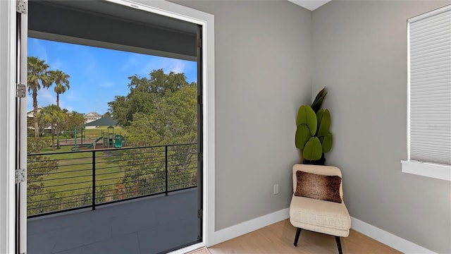 7551 Excitement Dr, Reunion, FL 34747 - unfurnished room featuring wood finished floors and baseboards