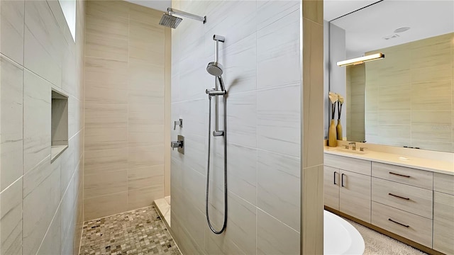 7551 Excitement Dr, Reunion, FL 34747 - full bath with a tile shower, vanity, and tile walls