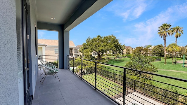 7551 Excitement Dr, Reunion, FL 34747 - balcony featuring a residential view