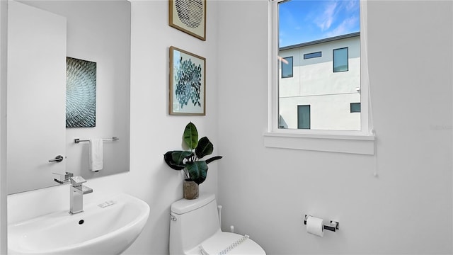 7551 Excitement Dr, Reunion, FL 34747 - bathroom featuring a sink and toilet