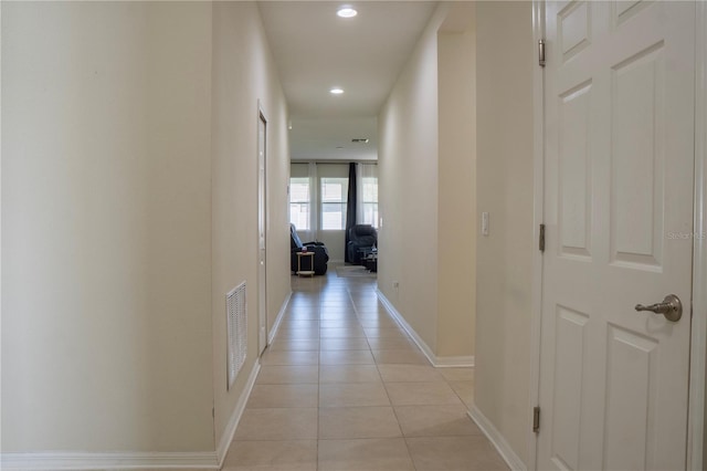 2712 Creekmore Ct, Kissimmee, FL 34746 - hall with light tile patterned floors and recessed lighting