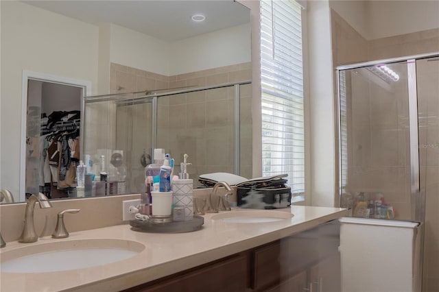 2712 Creekmore Ct, Kissimmee, FL 34746 - full bath with double vanity, a stall shower, and a walk in closet