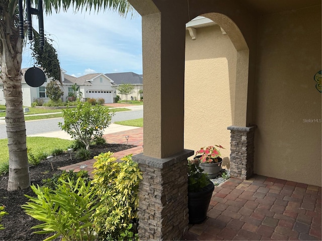 16856 Meadows St, Clermont, FL 34714 - view of patio featuring a residential view