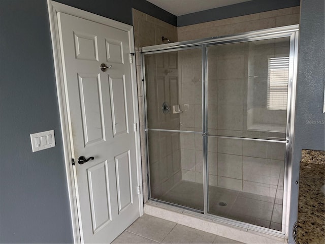 16856 Meadows St, Clermont, FL 34714 - full bath with a stall shower and tile patterned floors