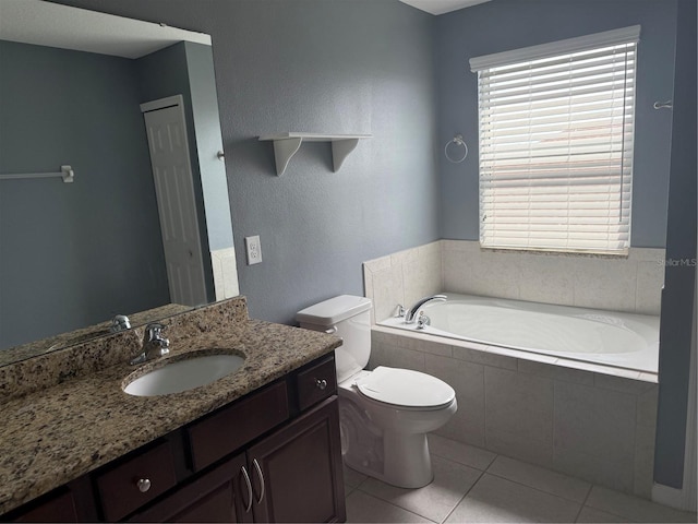 16856 Meadows St, Clermont, FL 34714 - full bath with a garden tub, vanity, and tile patterned flooring