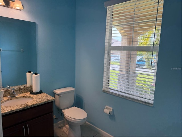 16856 Meadows St, Clermont, FL 34714 - bathroom with vanity and tile patterned floors