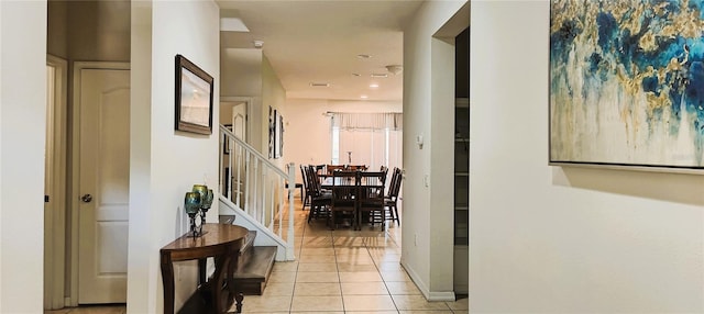 2183 Tripoli Ct, Kissimmee, FL 34747 - corridor with stairs and light tile patterned floors