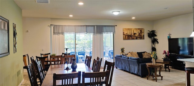 2183 Tripoli Ct, Kissimmee, FL 34747 - dining area with recessed lighting and light tile patterned flooring