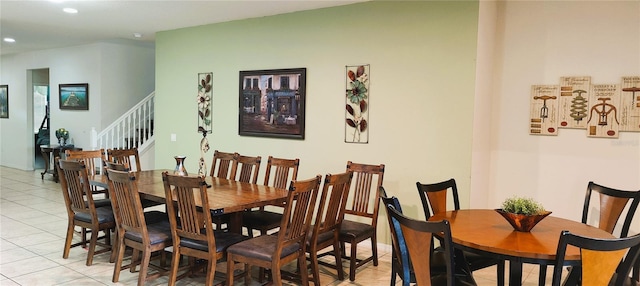 2183 Tripoli Ct, Kissimmee, FL 34747 - dining area with light tile patterned floors, recessed lighting, and stairway