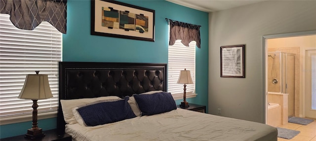 2183 Tripoli Ct, Kissimmee, FL 34747 - tiled bedroom featuring ensuite bathroom