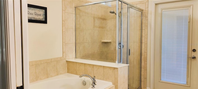 2183 Tripoli Ct, Kissimmee, FL 34747 - full bathroom with a shower stall and a garden tub