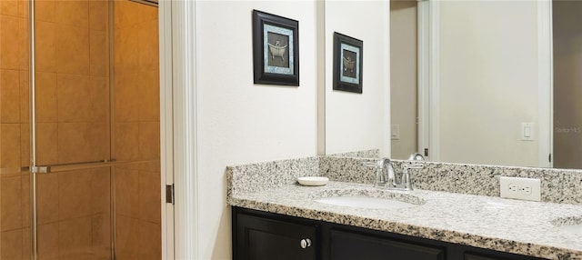 2183 Tripoli Ct, Kissimmee, FL 34747 - bathroom featuring double vanity and tiled shower