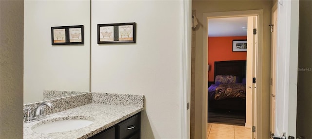 2183 Tripoli Ct, Kissimmee, FL 34747 - bathroom with vanity, tile patterned flooring, and connected bathroom