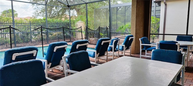 2183 Tripoli Ct, Kissimmee, FL 34747 - sunroom / solarium featuring outdoor dining area