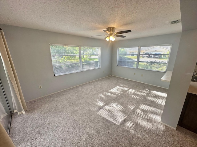 13102 Pembrook Ct, Hudson, FL 34667 - unfurnished bedroom with carpet, a textured ceiling, and ceiling fan